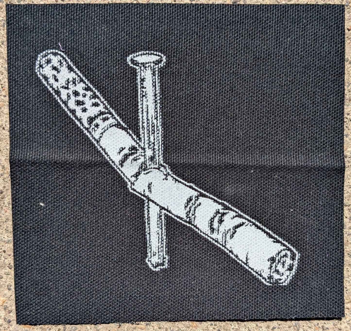 Nailed: Nailed Cigarette by Johnny Simon Patch